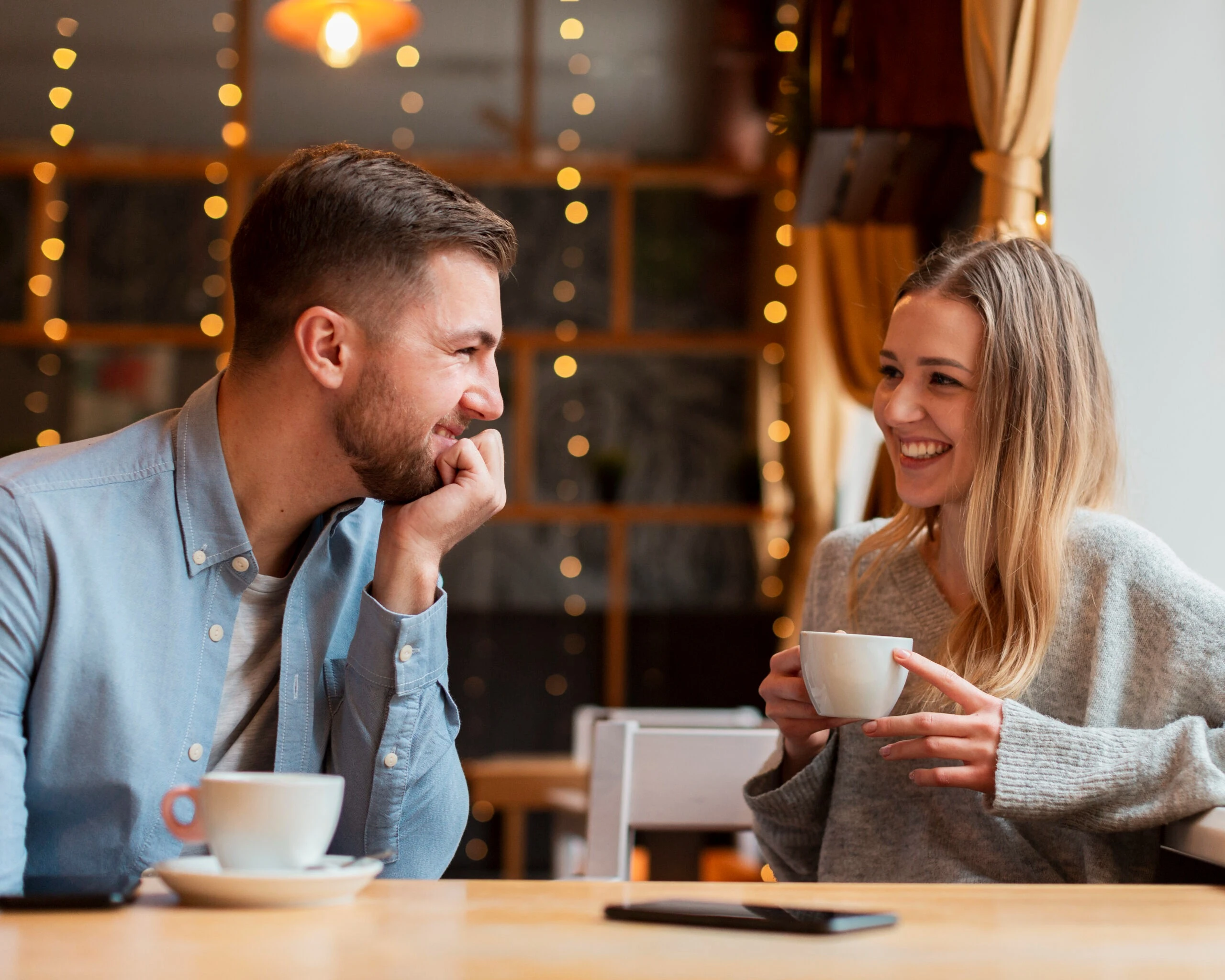 Couple talking openly during online couples therapy in California