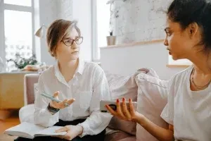 Client talking with a licensed therapist during an individual therapy session