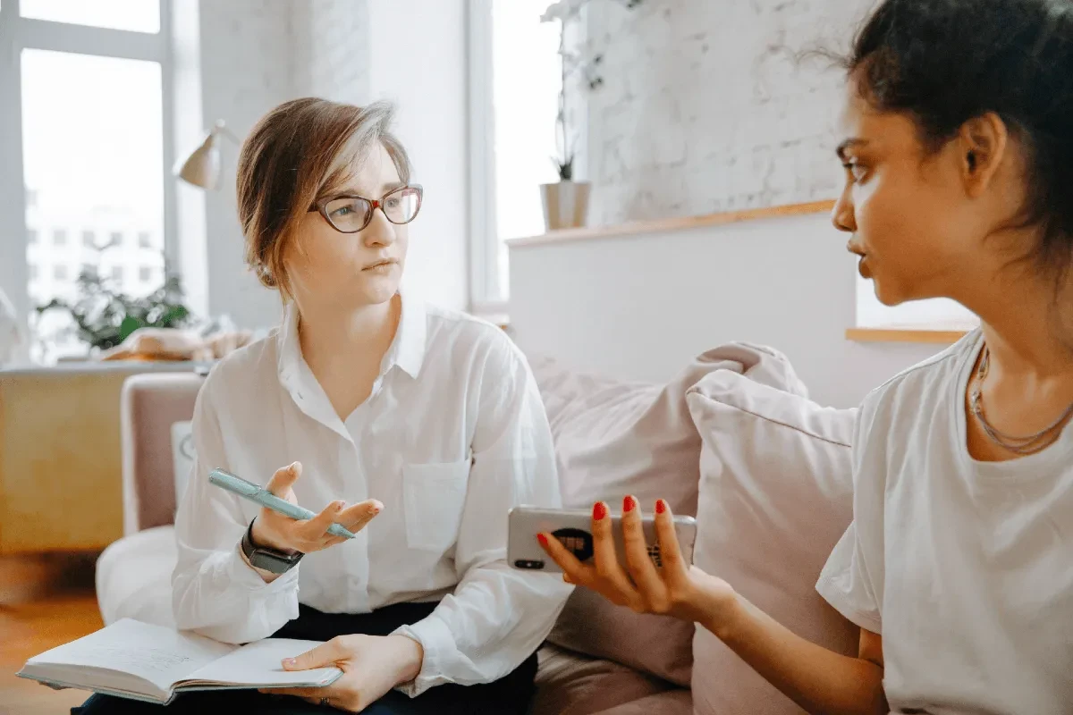 Teenager talking with a therapist during online teen therapy in California