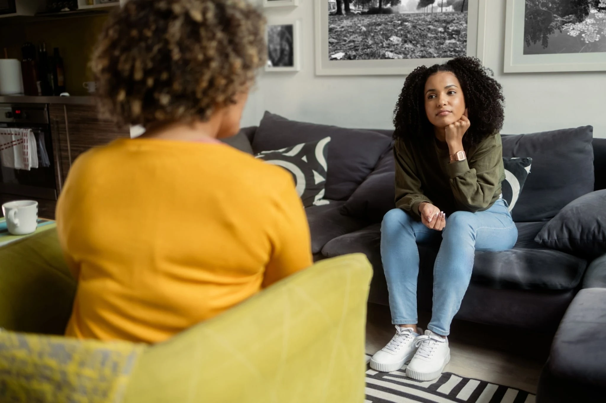 Client speaking with a therapist during a trauma-informed therapy session